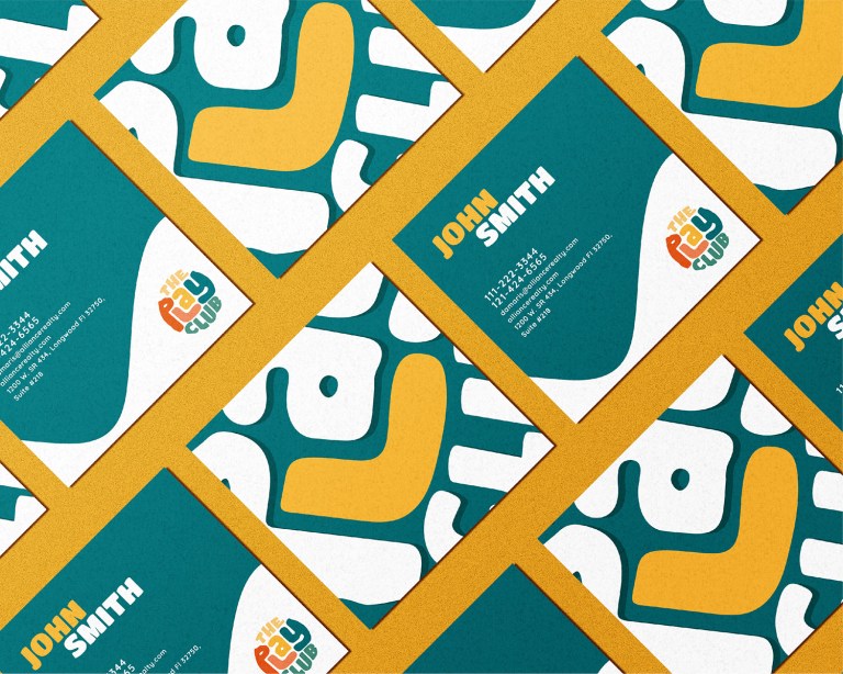 The Play Club day-care business card